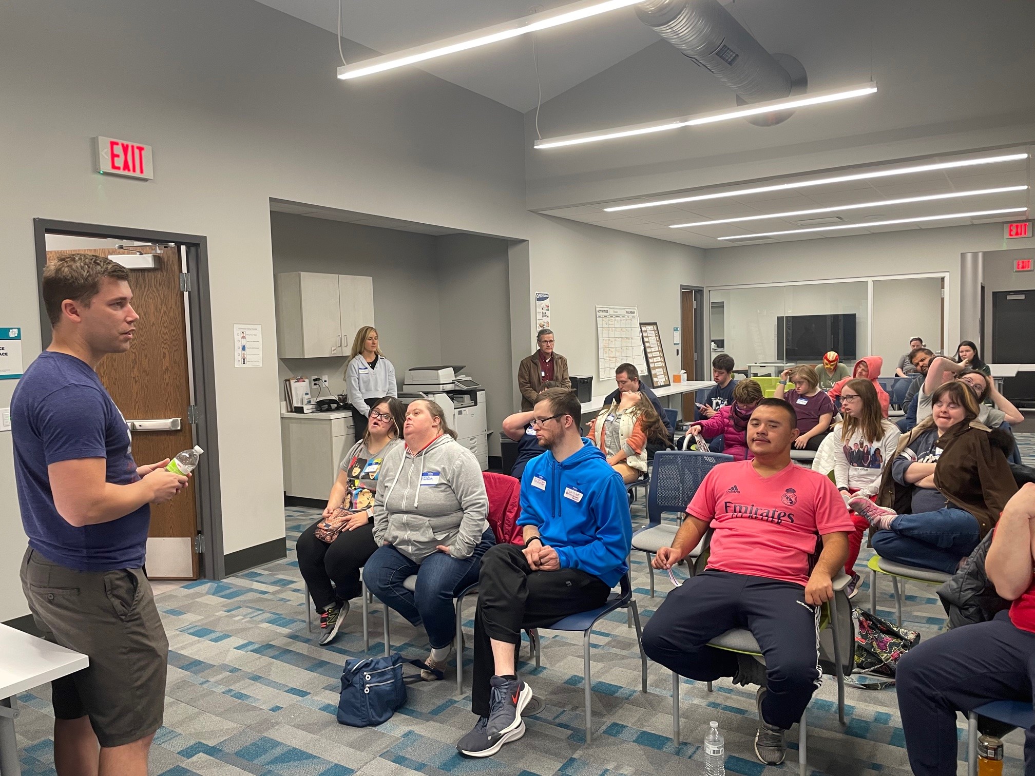 Scott Talking To Group Of Adults With Ds